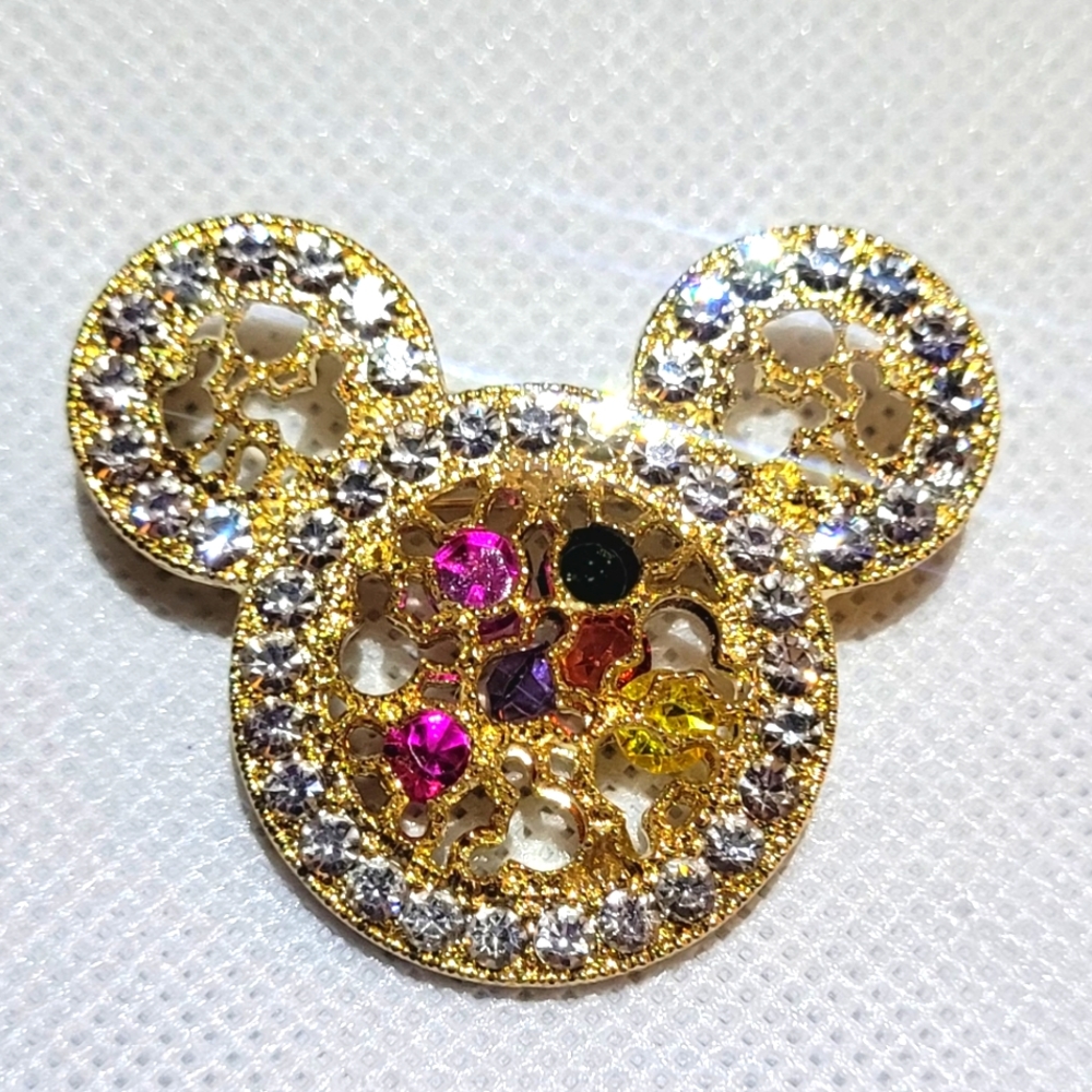 Pretty Goldtone Mickey or Minnie shaped brooch with Rhinestones. 1 1/2 "